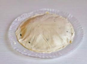 再盖上一张手抓饼。