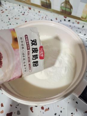 放入双皮奶粉100克！