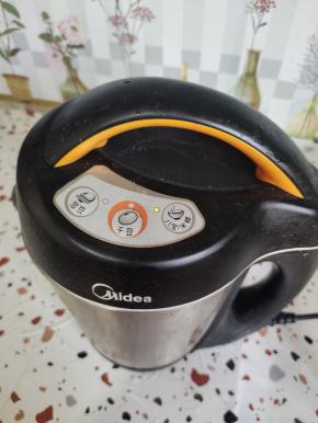 插上电源，按八宝米糊键！