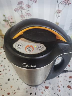 盖上盖子，插上电源，按八宝米糊键！