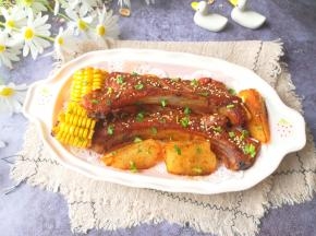 蒜香烤排骨出炉，撒点香菜碎。