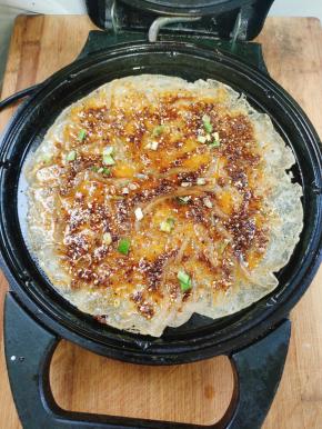 撒上适量的葱花！